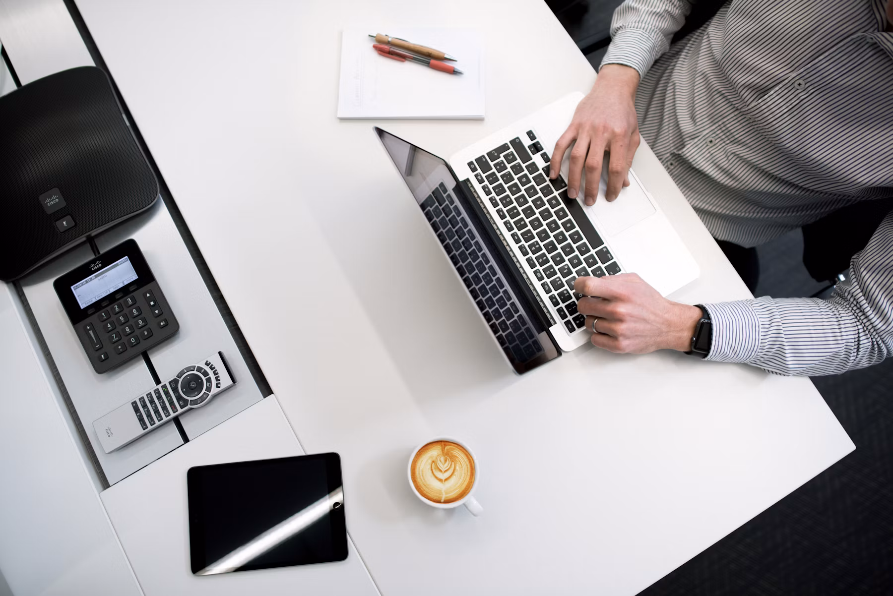 Professional reviewing compensation and financial planning documents