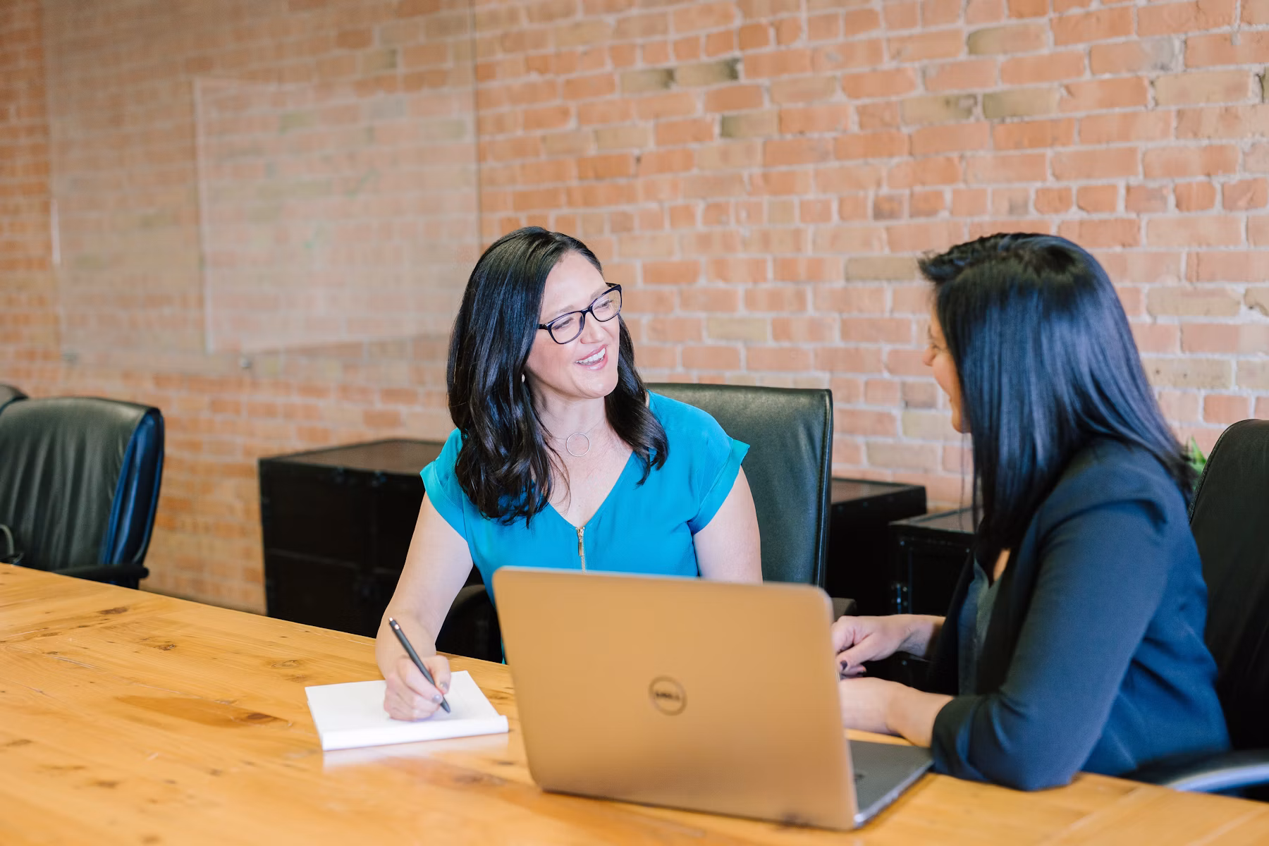 Financial advisor and clients reviewing a coordinated financial plan